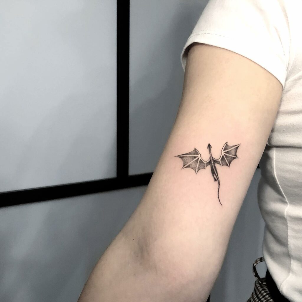 11+ Women's Feminine Dragon Tattoo Ideas That Will Blow Your Mind! 20 Minimalistic Dragon Tattoo Designs For Women