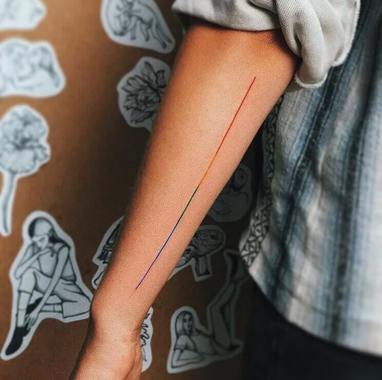 12+ LGBT Tattoo Ideas To Inspire You! 11 Minimalistic Rainbow Gradient Line Tattoo