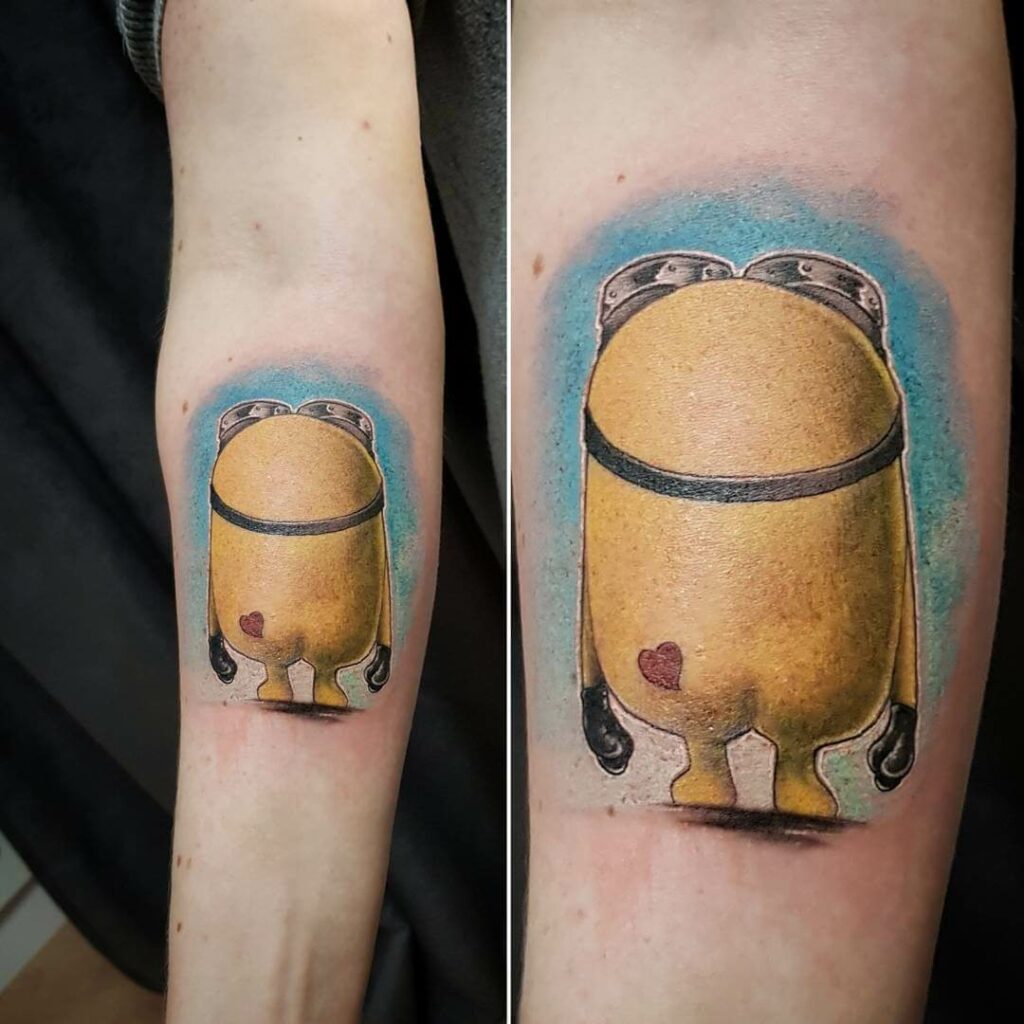 12+ Minion Tattoo Ideas To Inspire You! 20 Minion With A Heart Tattoo