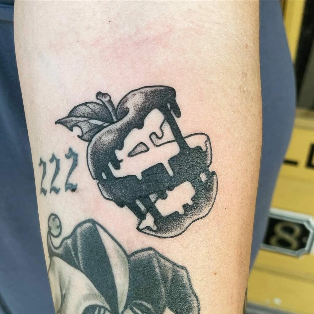 11+ Bad Apple Tattoo Ideas You'll Have To See To Believe! 16 Monochromatic Bad Apple Tattoo Designs