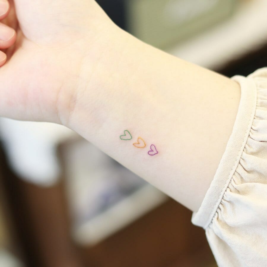 11+ Wrist Heart Tattoo Ideas That Will Blow Your Mind! 16 Multicolor Small Hearts Tattoos On Wrist