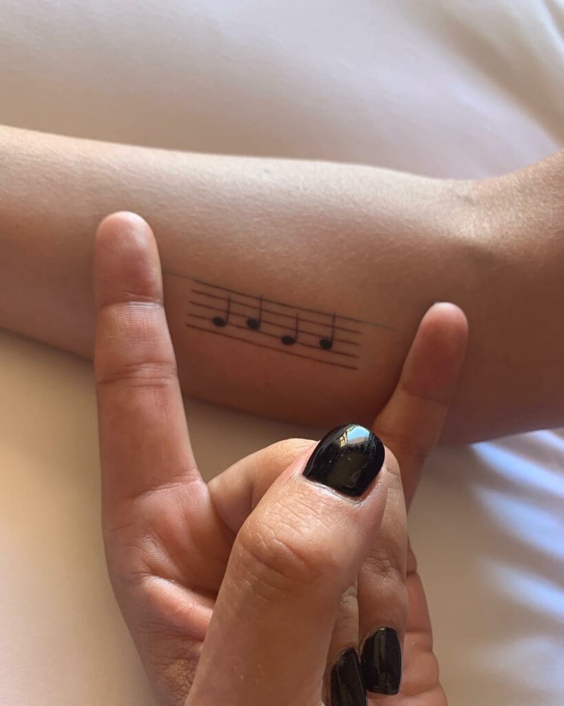 11+ Lady Gaga Tattoo Ideas That Will Blow Your Mind! 12 Musical Notes Tattoo