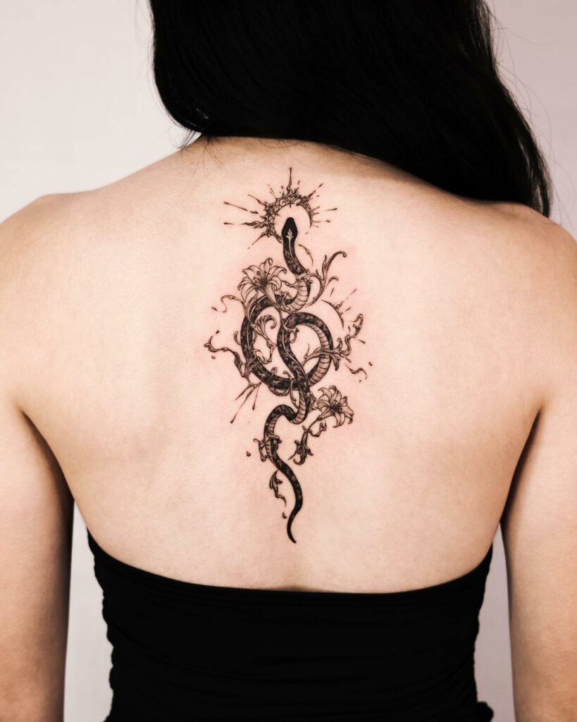 11+ Snake Flower Tattoo Ideas That Will Blow Your Mind! 18 Mythical Snake And Lilly Flower Tattoo
