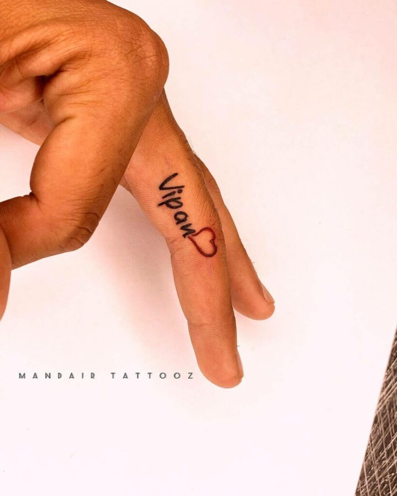 12+ Initial Tattoo On Finger Ideas To Inspire You! 12 Name with Heart Tattoo on Finger