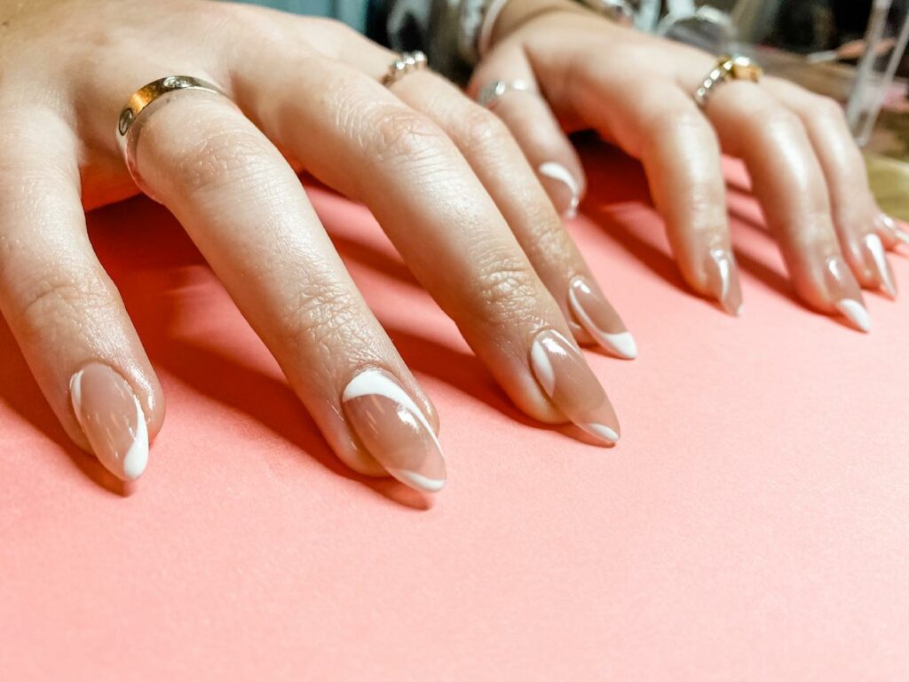 Shine Bright with 50 Rose Gold Nail Designs for 2024 58 Negative Space rose gold nails
