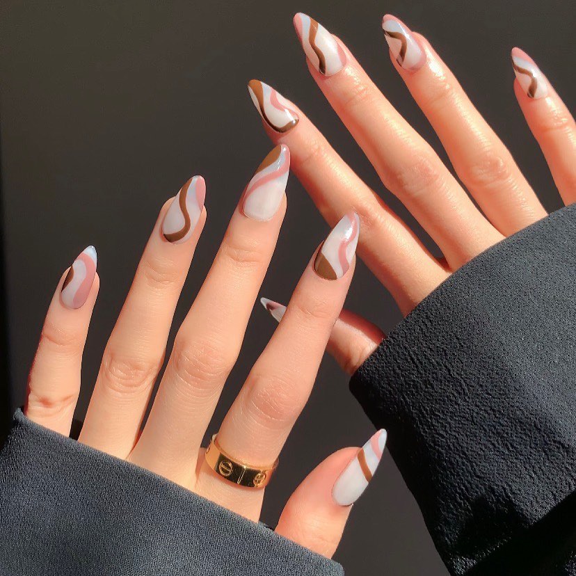 22 Latest Preppy Nail Ideas To Try In 2024! 20 Balanced Nude and Swirls Preppy Nail Designs