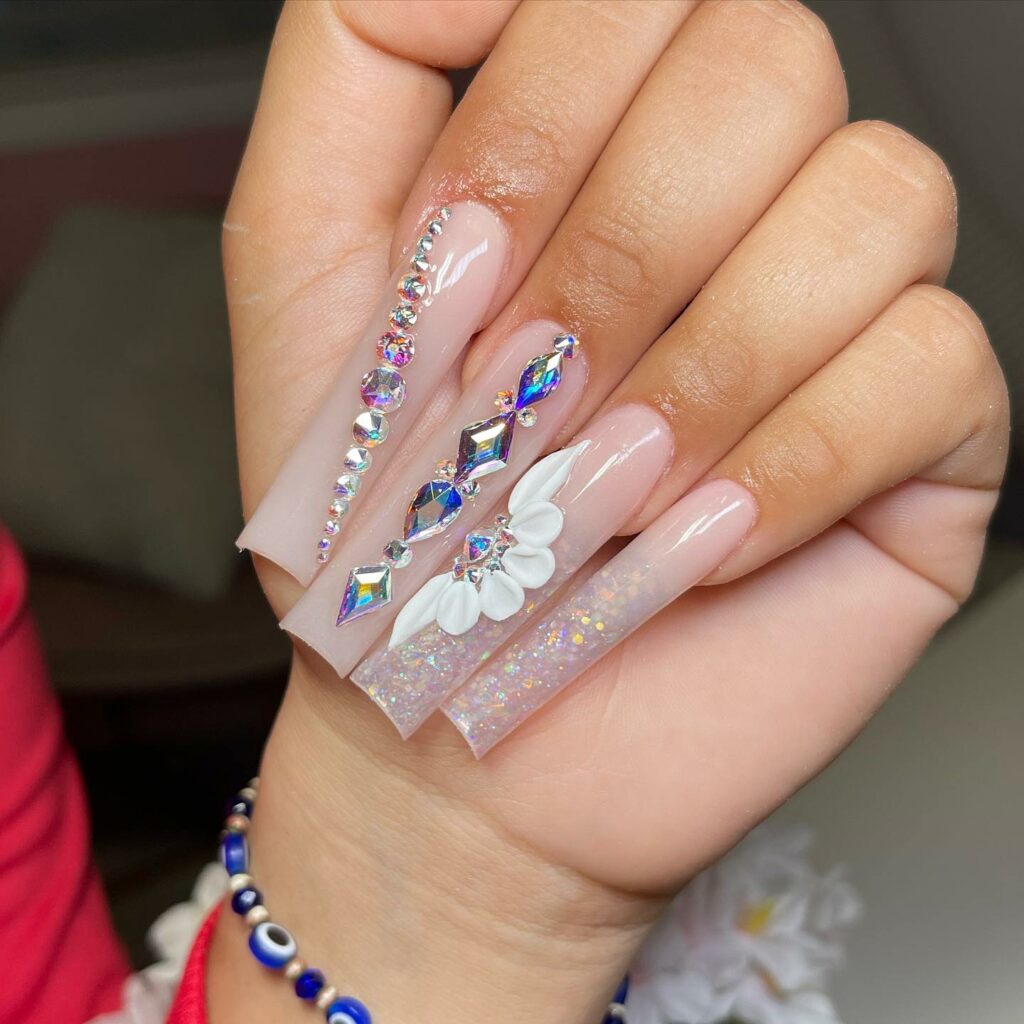 29 Latest Long Square Acrylic Nail Designs To Try In 2024! 23 Beige Square Acrylics Adorned with Shimmering Gems