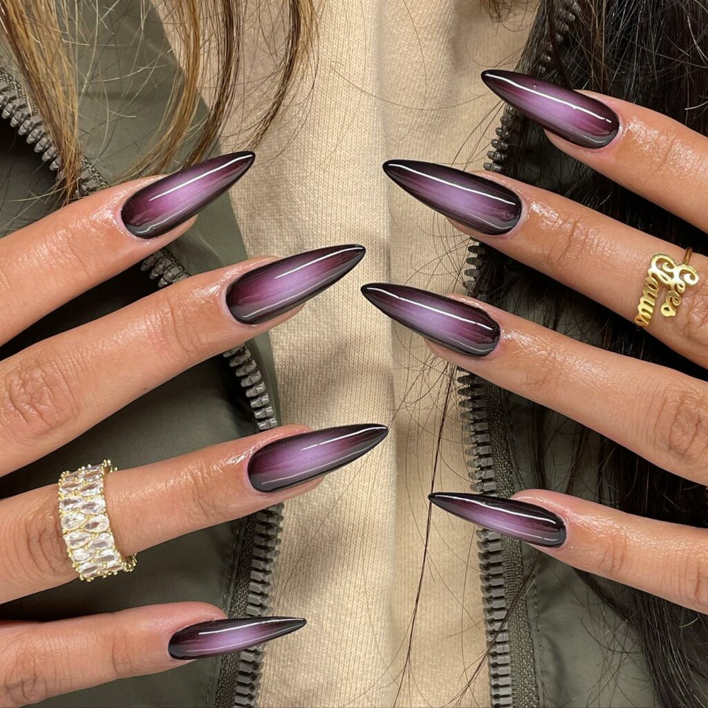 30 Latest Black Almond Nail Ideas To Try In 2024! 25 Ombre Black Almond Nails with a Soft Fade