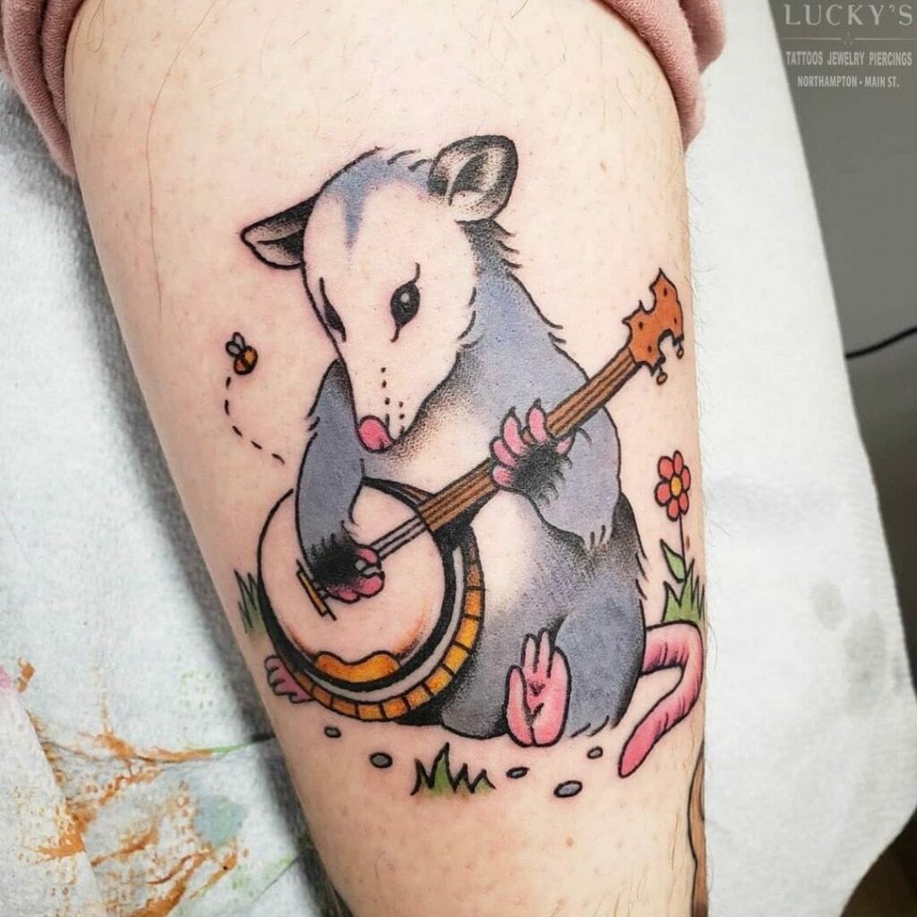 11+ Banjo Tattoo Ideas To Inspire You! 15 Opossum Playing Banjo Design Tattoo