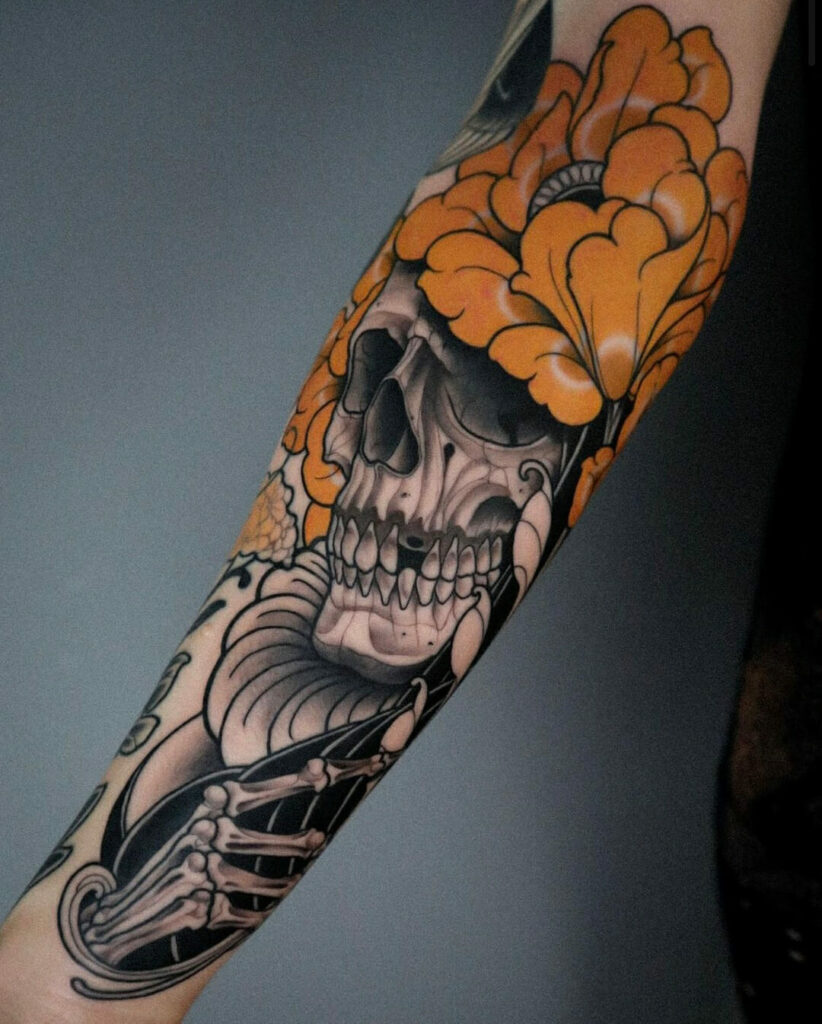 10+ Forearm Skull Tattoo Designs Which Will Blow Your Mind! 17 Orange And Black Skull And Crossbones Tattoo Design Ideas