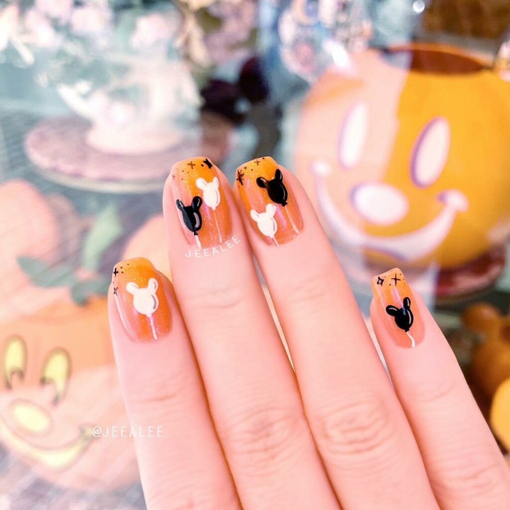 Add Whimsy with 35 Mickey Mouse Nail Designs in 2024 35 Citrus-Toned Mickey Mouse Nails