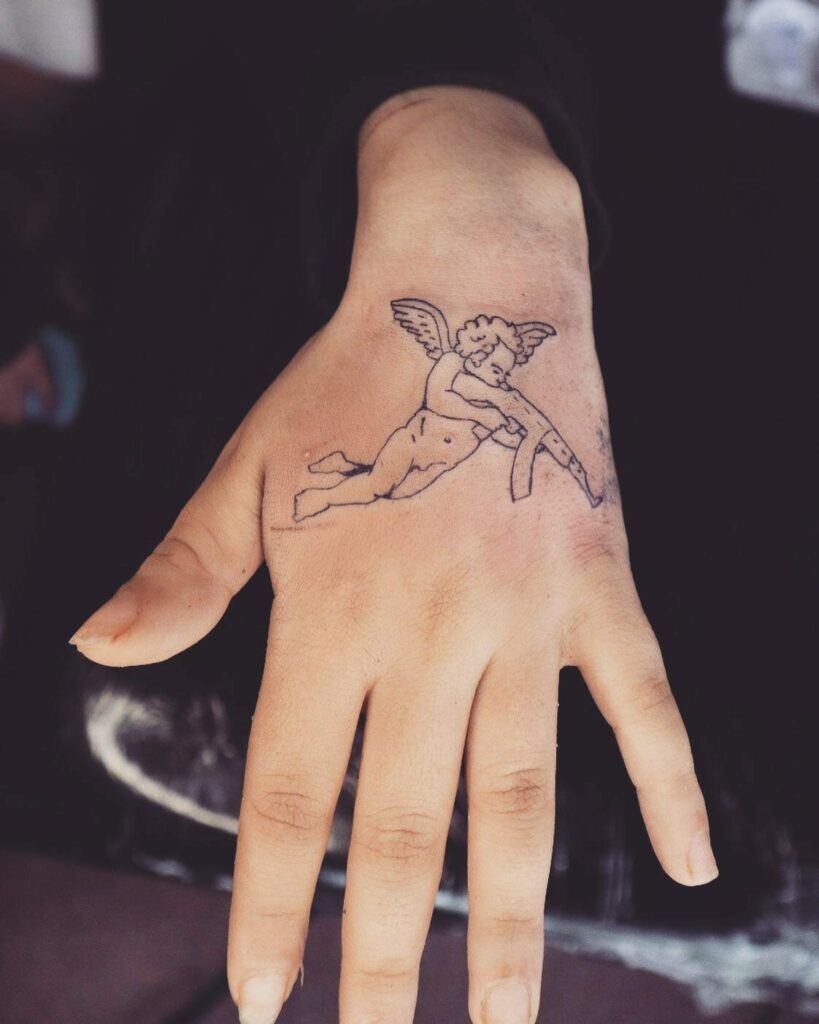 11+ Angel With Gun Tattoo Ideas That Will Blow Your Mind! 14 Outlined Angel With A Gun Tattoos