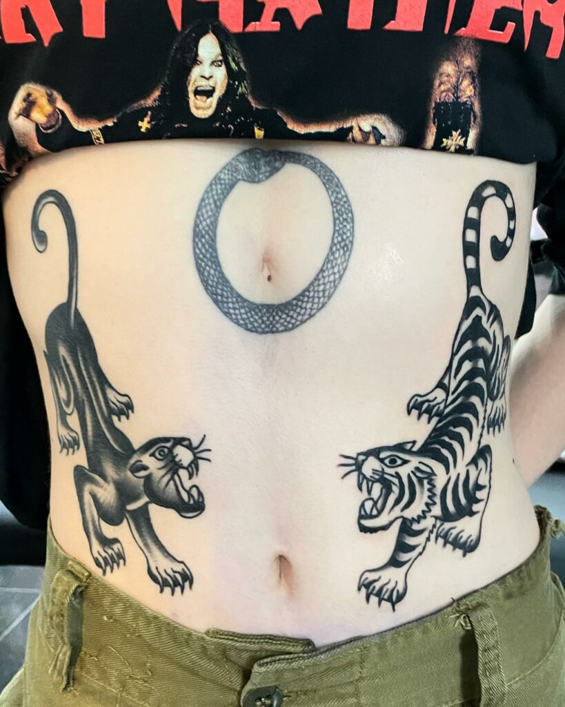 10+ V Line Tattoo Ideas That Will Blow Your Mind! 19 Panther V Line Tattoo Design