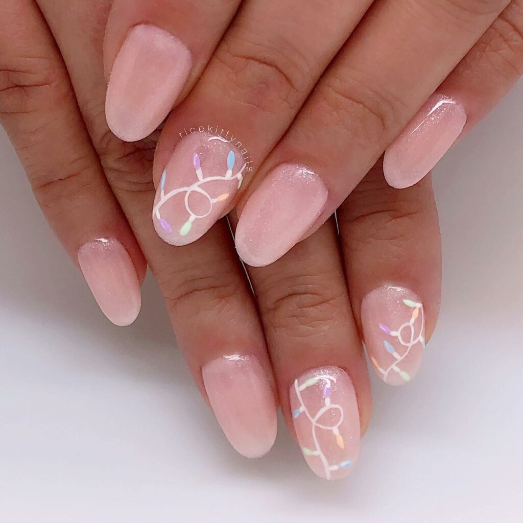 Celebrate with 40 Christmas Statement Nail Designs in 2024 44 Pastel Christmas Lights Nails
