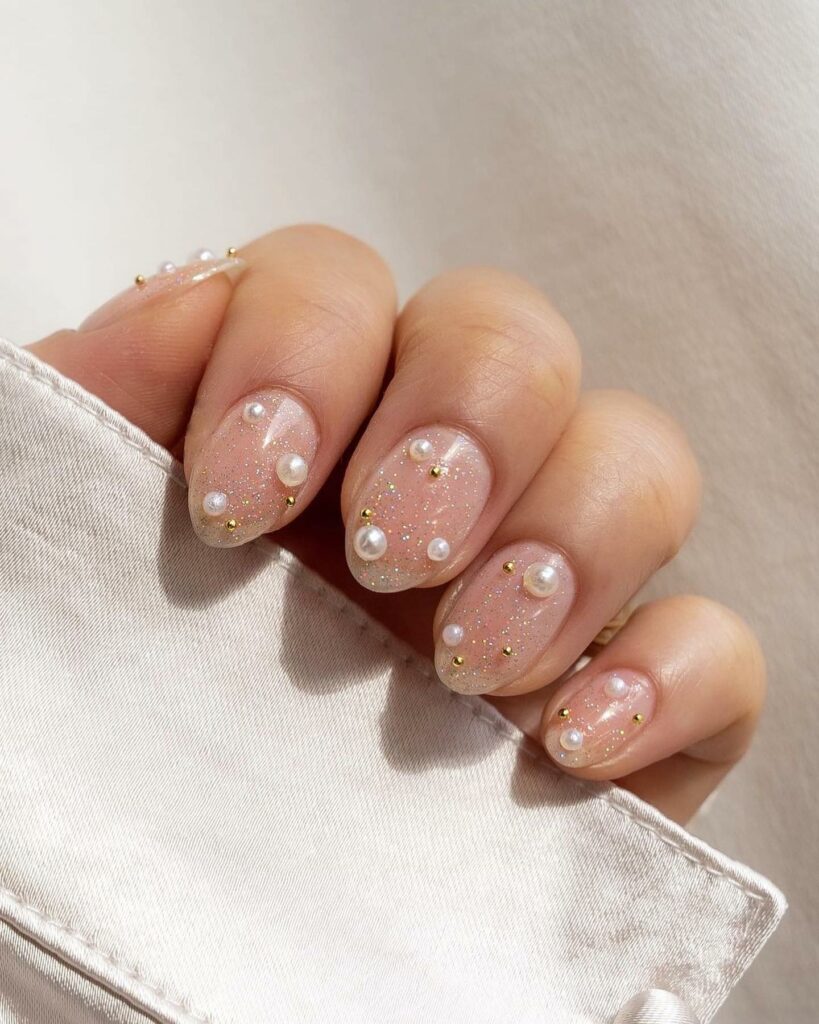 Celebrate with 33 Short Christmas Nail Ideas in 2024 18 Pearls and Studs Clear Short Christmas Nails