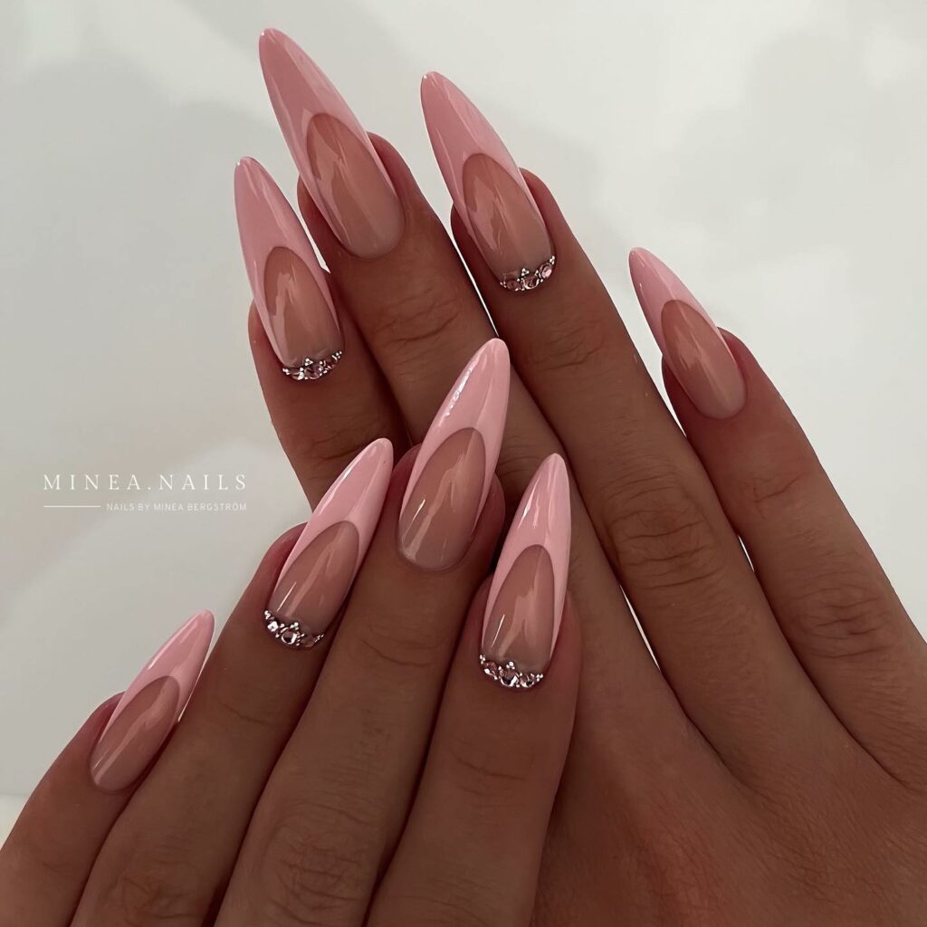 50 Latest Almond Shape Nail Ideas To Try In 2024! 28 Pink Almond Nails with a Sparkling Twist