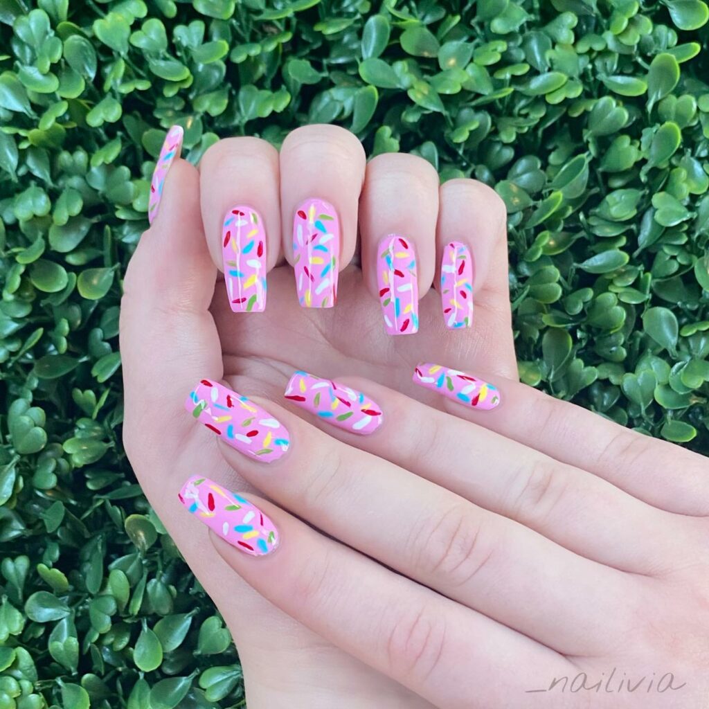Exciting Birthday Nail Inspirations for 2024 π 10 Pink Icing on Blush Base, Sprinkles, and Gemstones