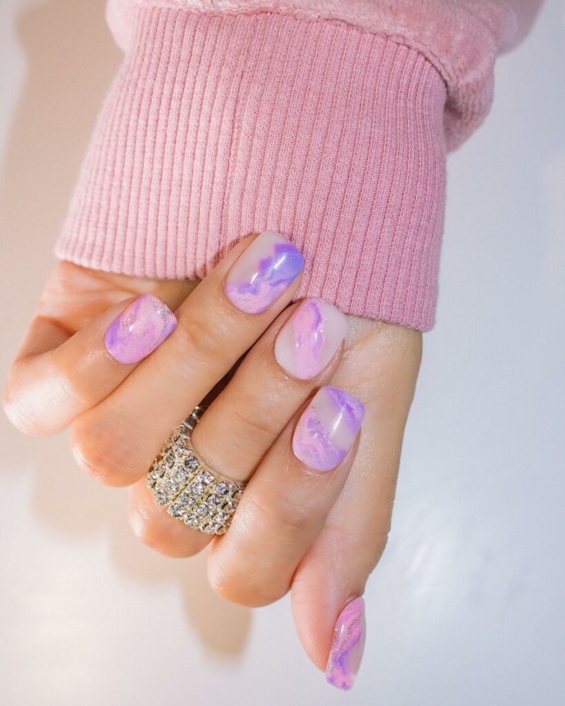 Indulge in 40 Marble Nail Designs for 2024 18 Pink and Purple