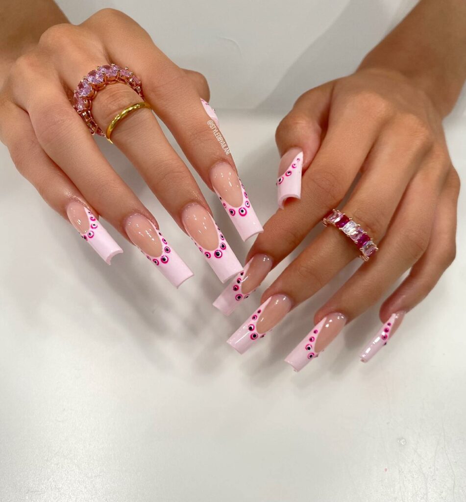 Channel Mystique with 20 Evil-Eye Nail Designs for 2024 18 Pink evil eye nails