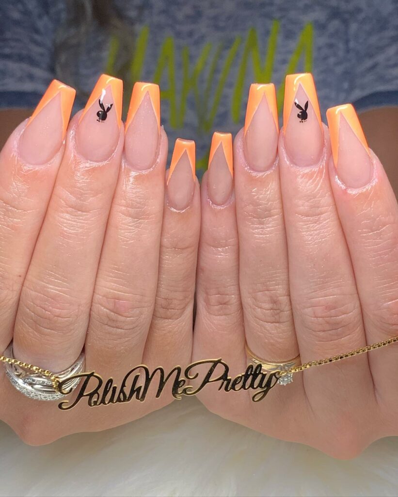 28 Stunning Playboy Nail Designs for 2024 35 Playboy Nails with a Zesty Orange French Manicure