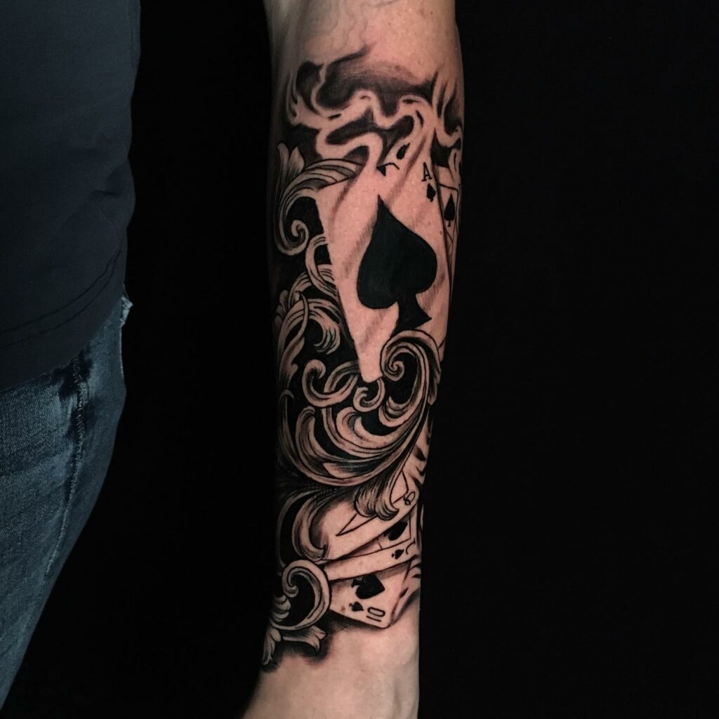 10+ Gambling Tattoo Ideas That Will Blow Your Mind! 16 Playing Cards Surrounded Gambling Tattoo Designs