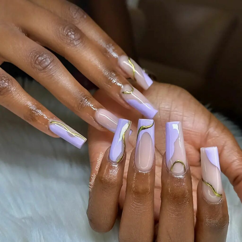 Indulge in 40 Marble Nail Designs for 2024 39 Purple Hues and Gold Marble nails