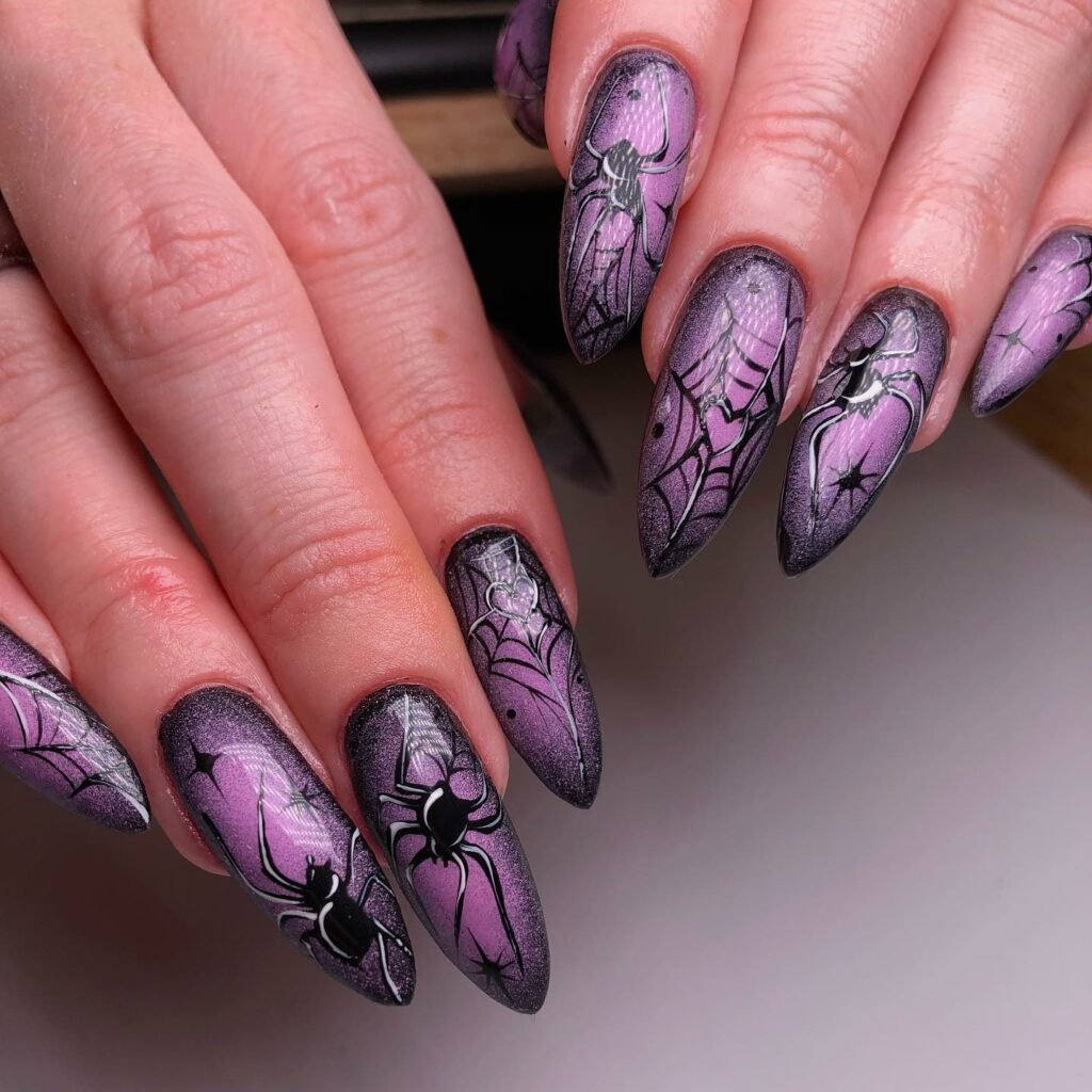 Get Spooky with 33 Black Halloween Nails To Try in 2024 37 Purple spider web nails