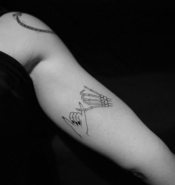 34 Hand Skeleton Tattoo Designs for 2024 16 Quirky Skeleton Hand Tattoos