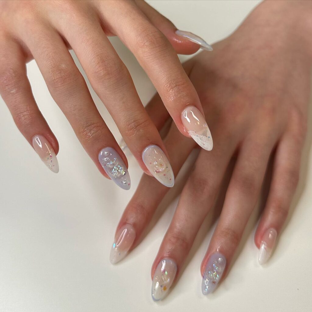Try in 2024: 39 Latest Short Almond Nail Designs 28 Rainbow Confetti short almond nails