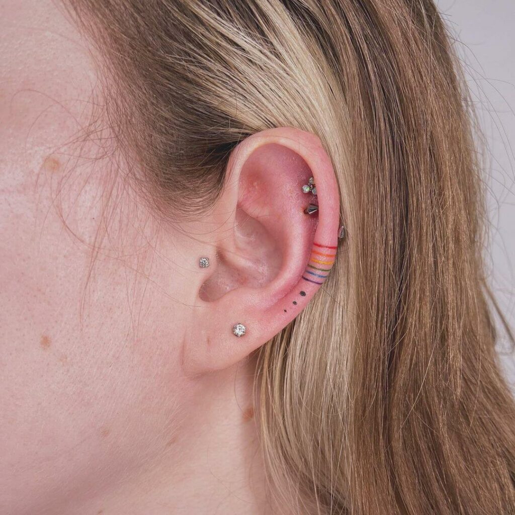 12+ LGBT Tattoo Ideas To Inspire You! 14 Rainbow Ear Tattoo