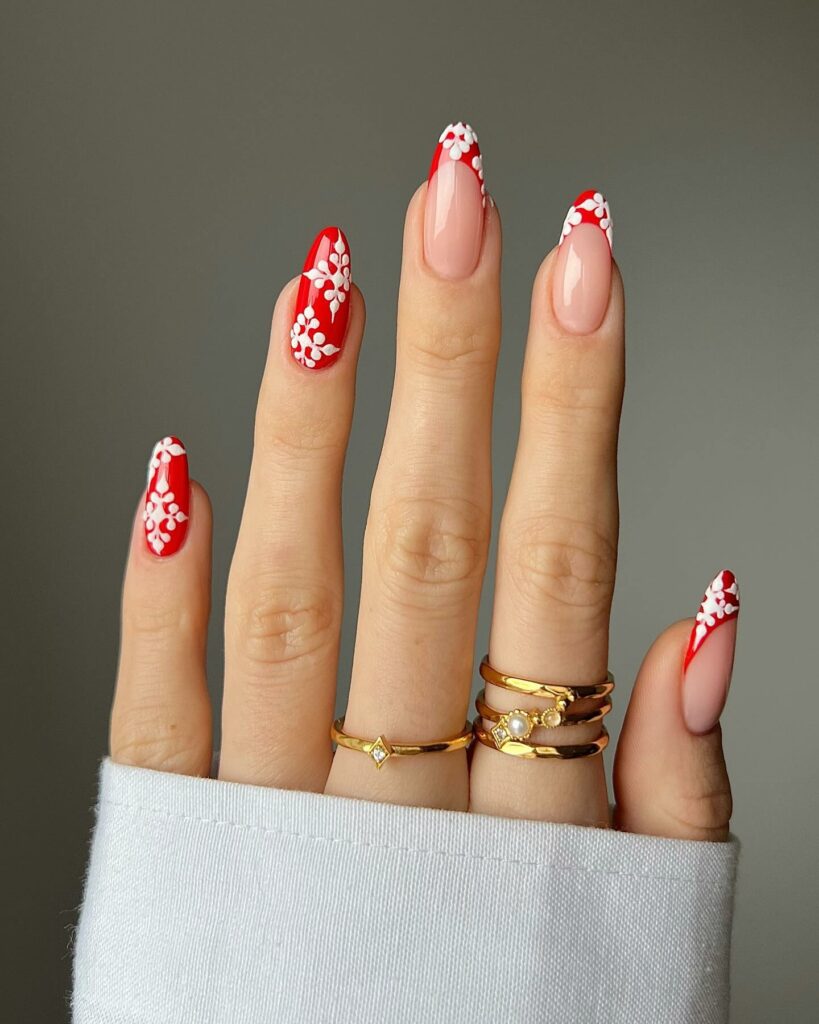 Feel Festive with 30 Christmas Almond Nail Ideas in 2024 28 Red Christmas Almond Nails with Snowflakes