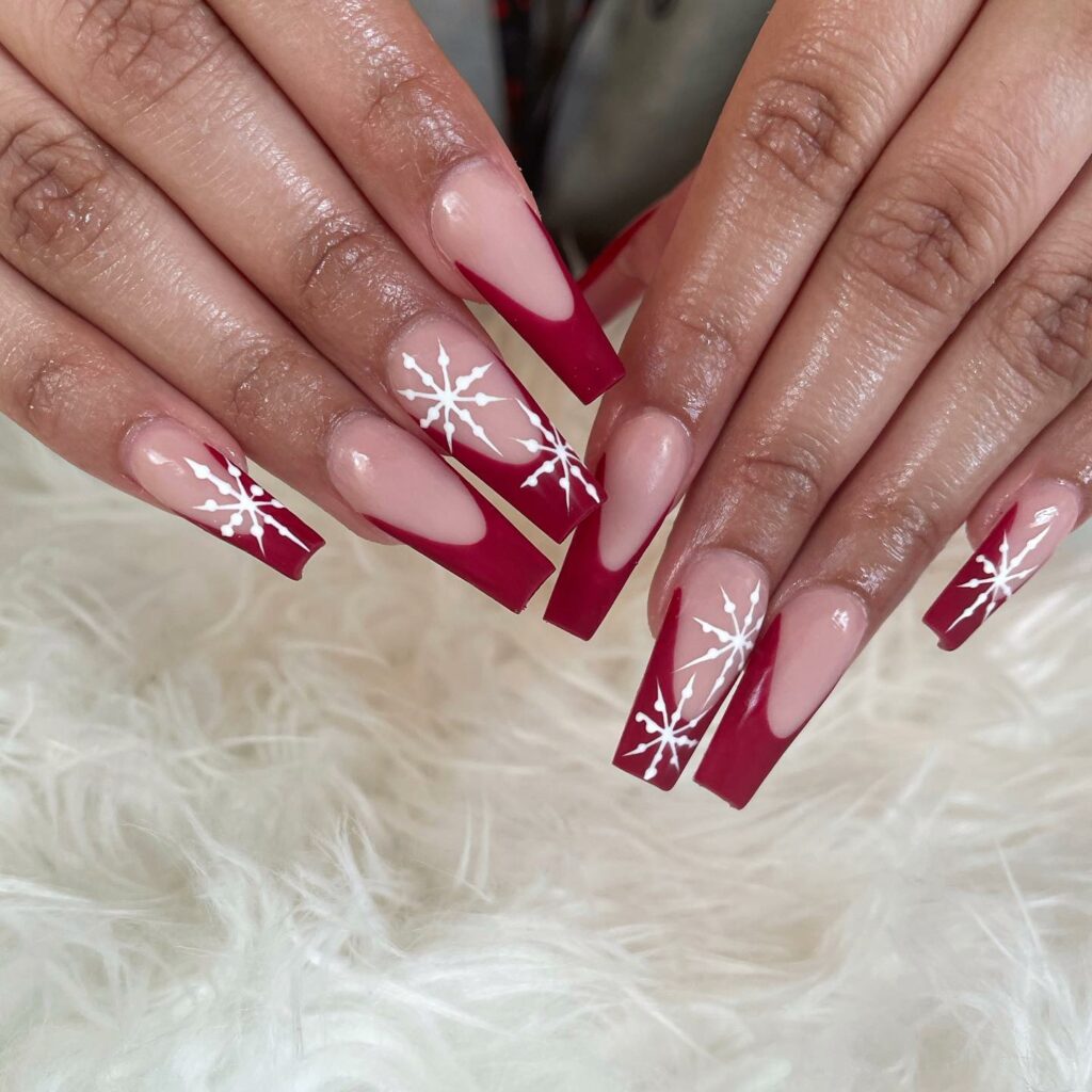 Go Bold with 40 Red Coffin Nail Designs in 2024 12 Snowflake Embellishments on Red Christmas Nails