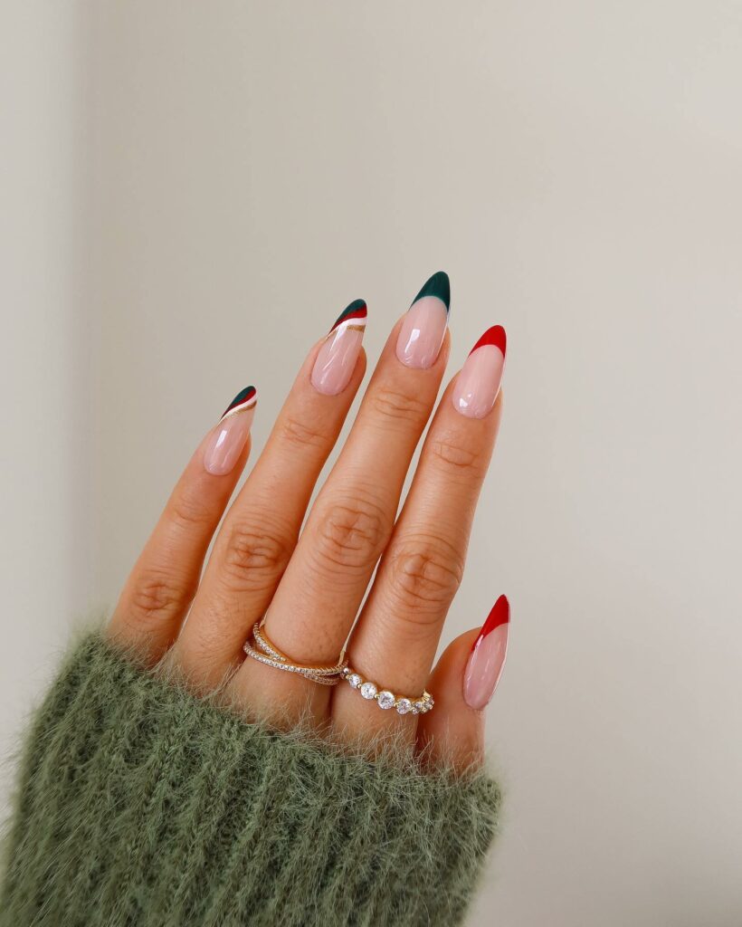 Get Festive with 20 Red And Green Christmas Nail Ideas in 2024 17 Festive Red Accents on Lush Green Christmas Nails