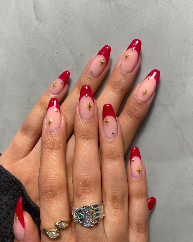 Shine Bright with 30 Red and Gold Christmas Nail Ideas in 2024 17 Starry Night with Red and Gold Star Nails