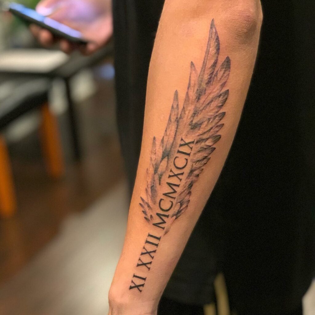 11+ Angel Wing Forearm Tattoo Ideas That Will Blow Your Mind! 11 Roman Numerals Angel Wing Tattoo