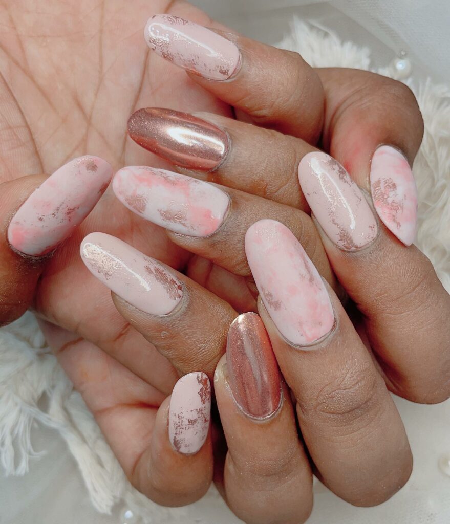 Shine Bright with 50 Rose Gold Nail Designs for 2024 51 Rose Gold Feathers