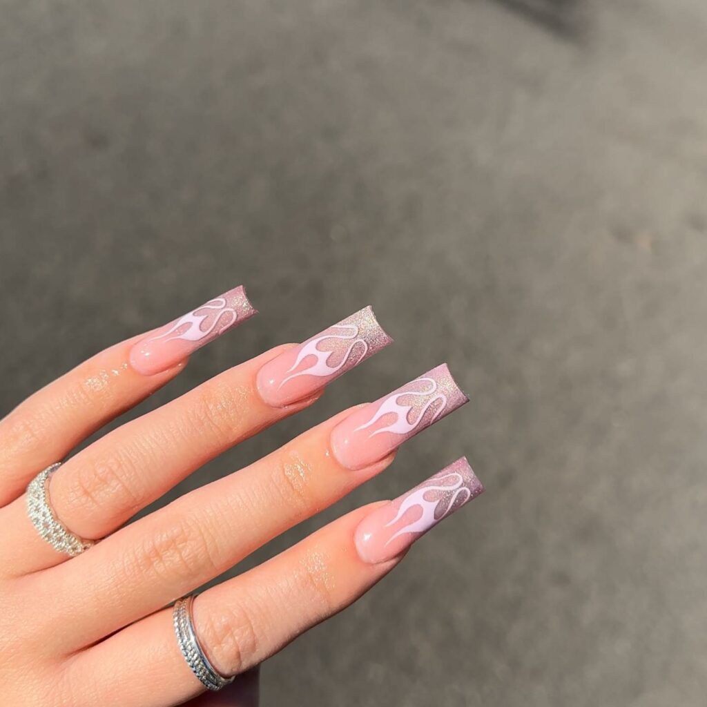 Shine Bright with 50 Rose Gold Nail Designs for 2024 57 Rose Gold Flames nails