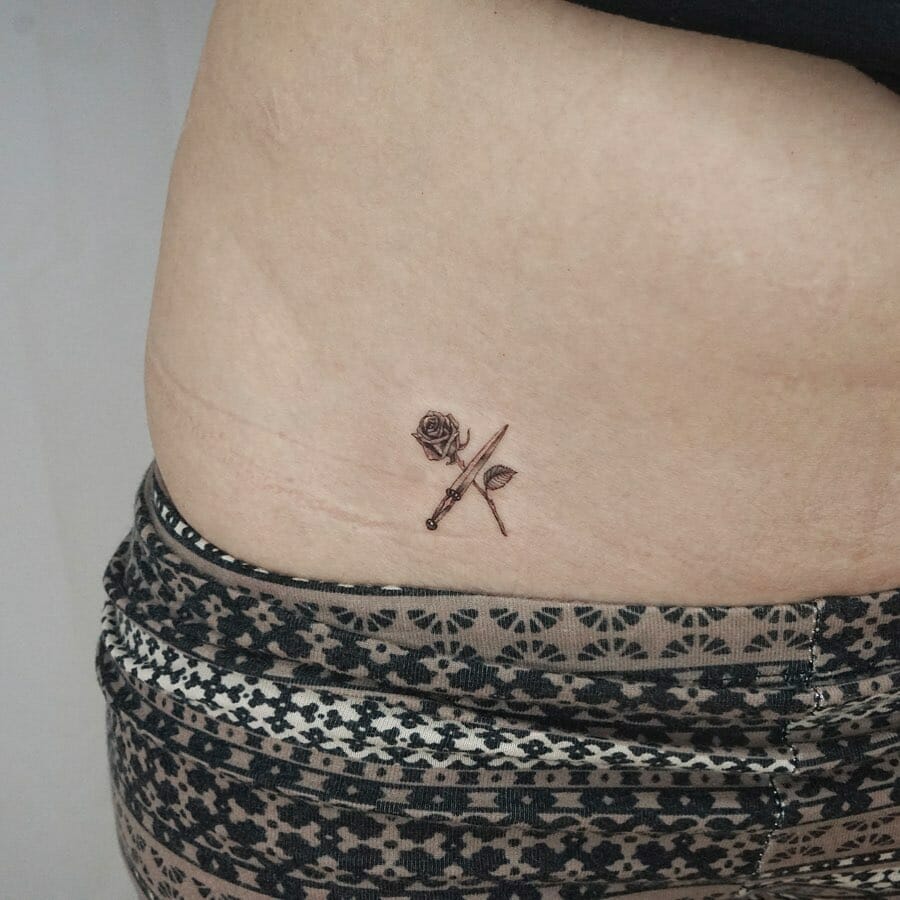 12+ Feminine Pelvic Tattoo Ideas That Will Blow Your Mind! 13 Rose and Dagger Design