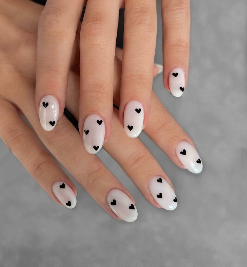 44 Latest White Nail Ideas To Try In 2024! 48 Round White Nails with Adorable Black Hearts
