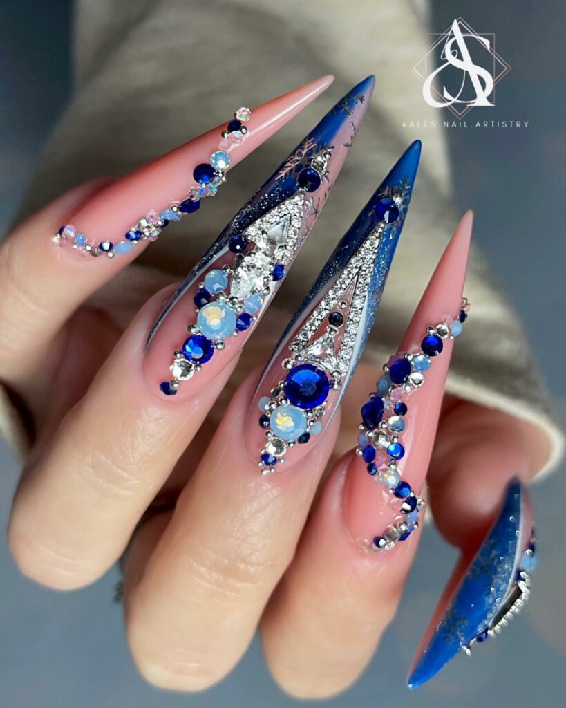 Get Festive with 20 Stiletto Christmas Nail Ideas in 2024 30 Royal Blue and Silver Stiletto Christmas Nails