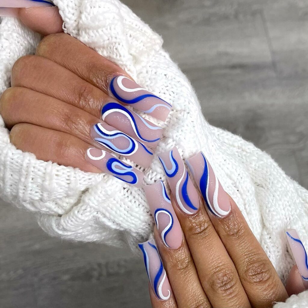 34 Latest Blue Acrylic Nail Designs To Try in 2024 37 Majestic Royal Blue and White Swirl Acrylic Nails