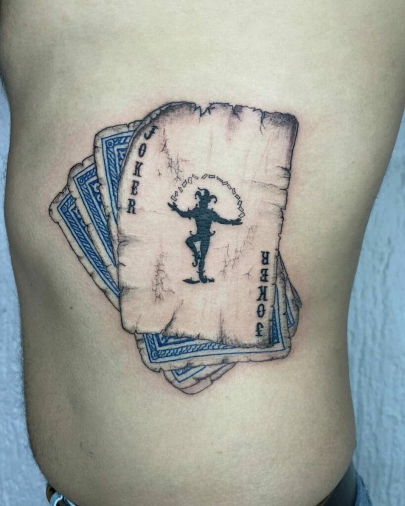 10+ Joker Card Tattoo Ideas You Have to See to Believe! 12 Rugged Playing Cards Joker Tattoo Design