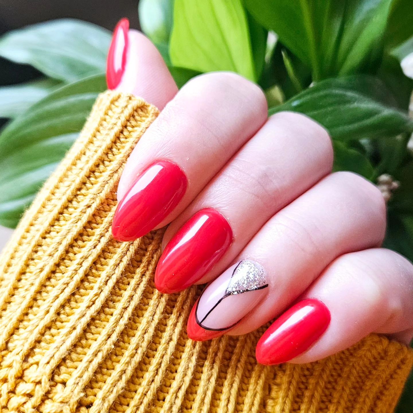 20 Latest Edgy Nail Designs With Drawings to Try In 2024! 36 Sassy Red Almond Nails with Glittery Accent