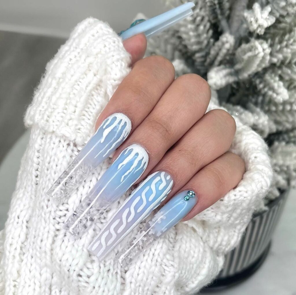 Celebrate with 40 Christmas Statement Nail Designs in 2024 51 Serene Sky Blues Acrylic Christmas Nails