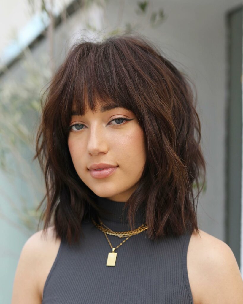 7 Best Ways to Style Your Layered Hair in 2024 13 Shag Hairdo