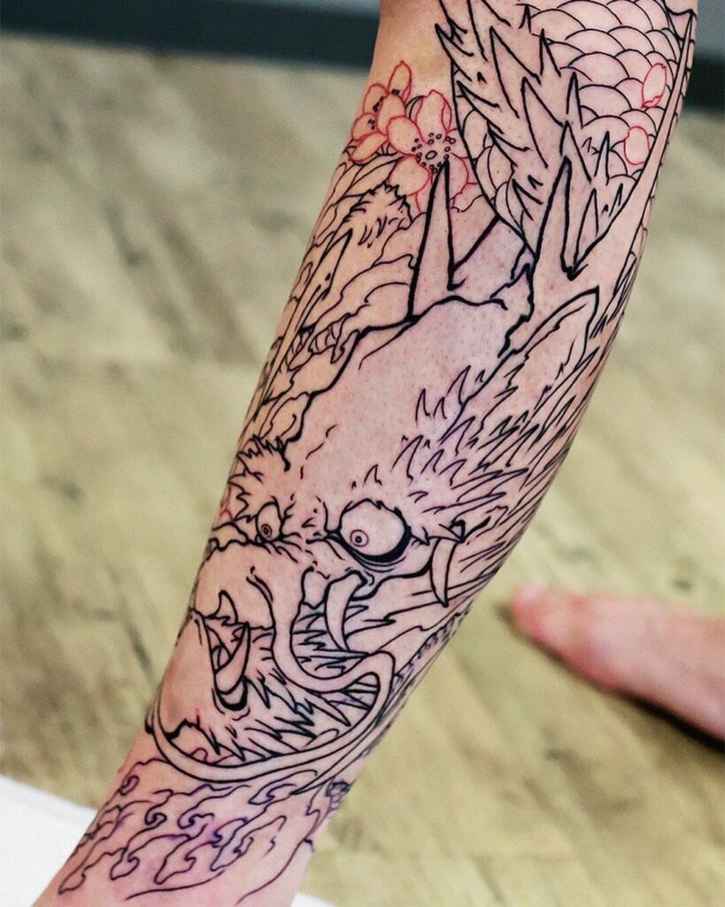 12+ Black Outline Tattoo Ideas To Inspire You! 12 Shin & Calf Dragon Tattoo Using Black Outlining