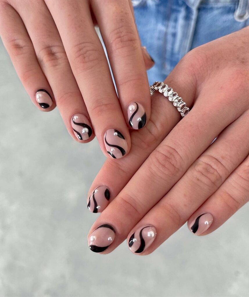 22 Latest Short Black French Tip Nail Ideas To Try In 2024! 31 Short Black French Nails with Pearlescent Swirl Accents