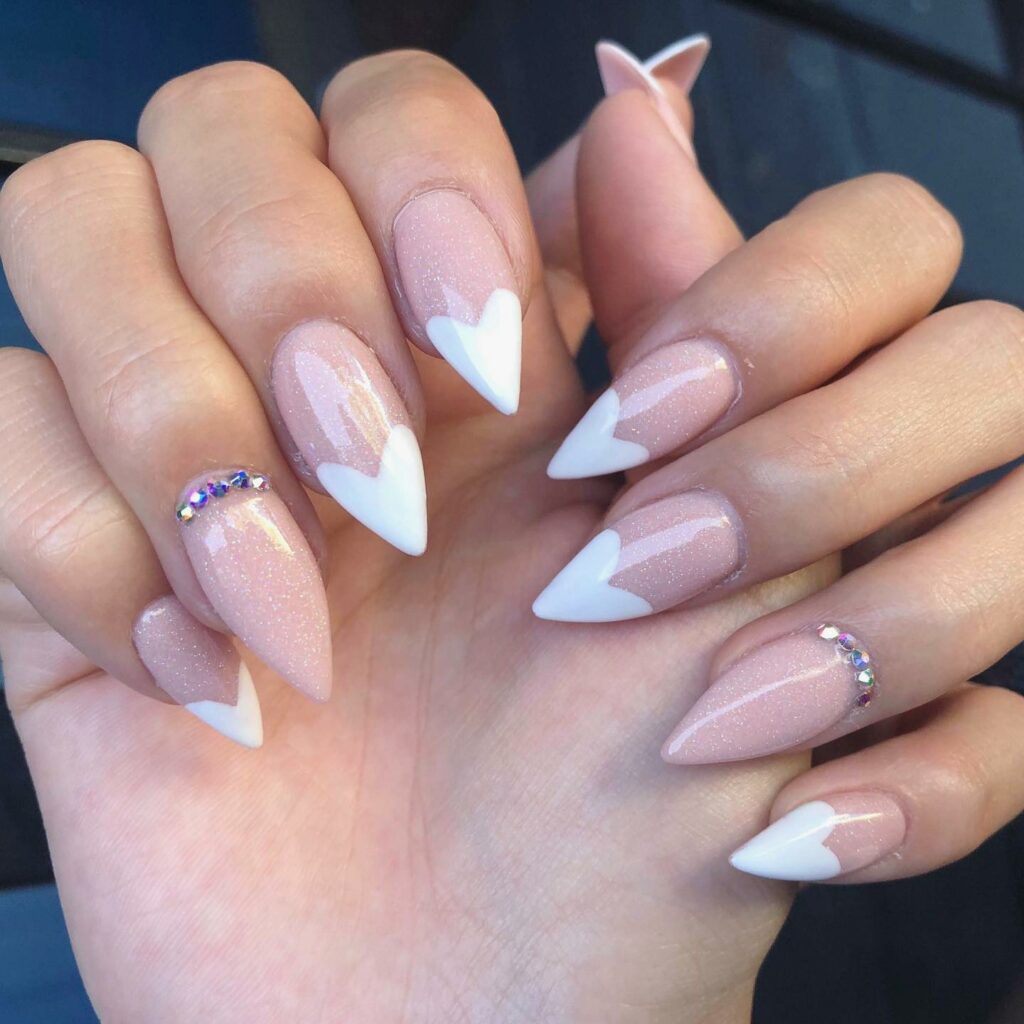 35 Latest Short Stiletto Nail Ideas to Try in 2024! 16 White French Heart on Short Stiletto Nails