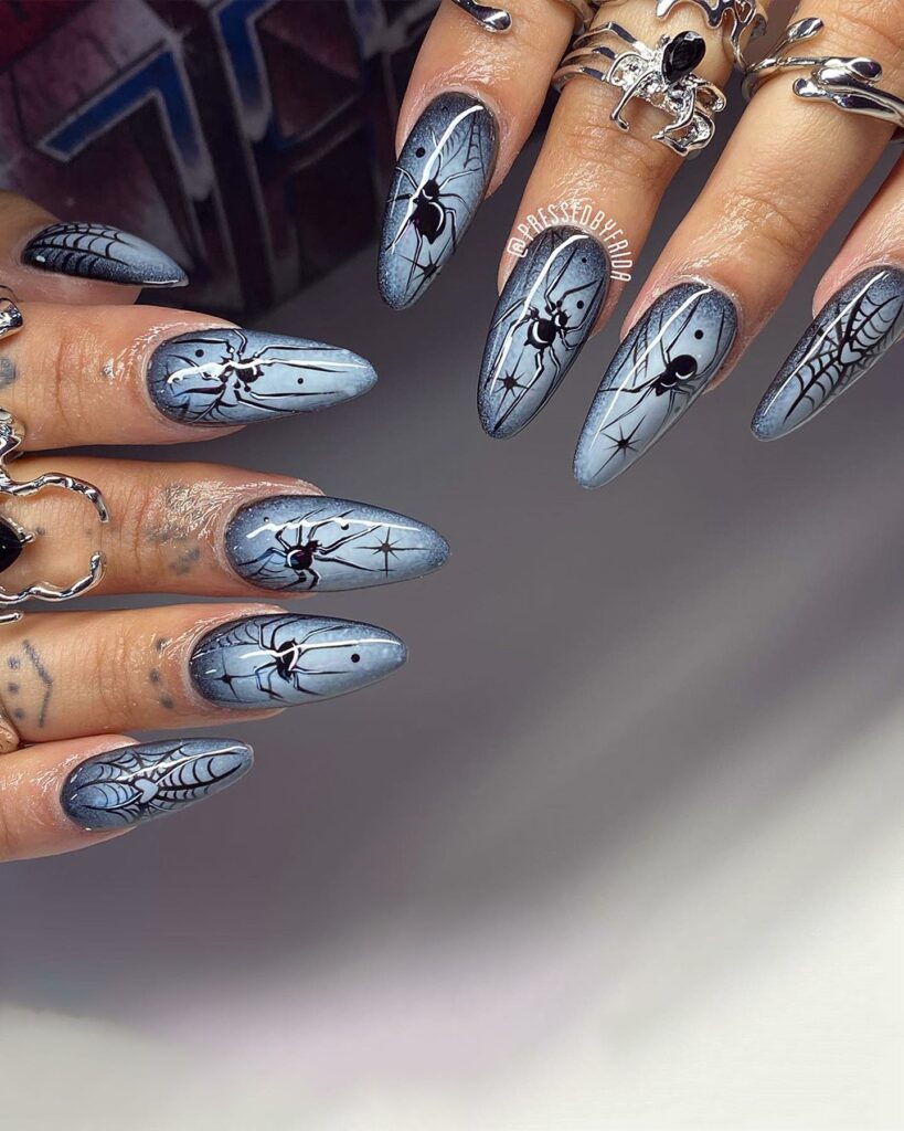 Get Spooky with 33 Black Halloween Nails To Try in 2024 36 Silver and White spider web nails
