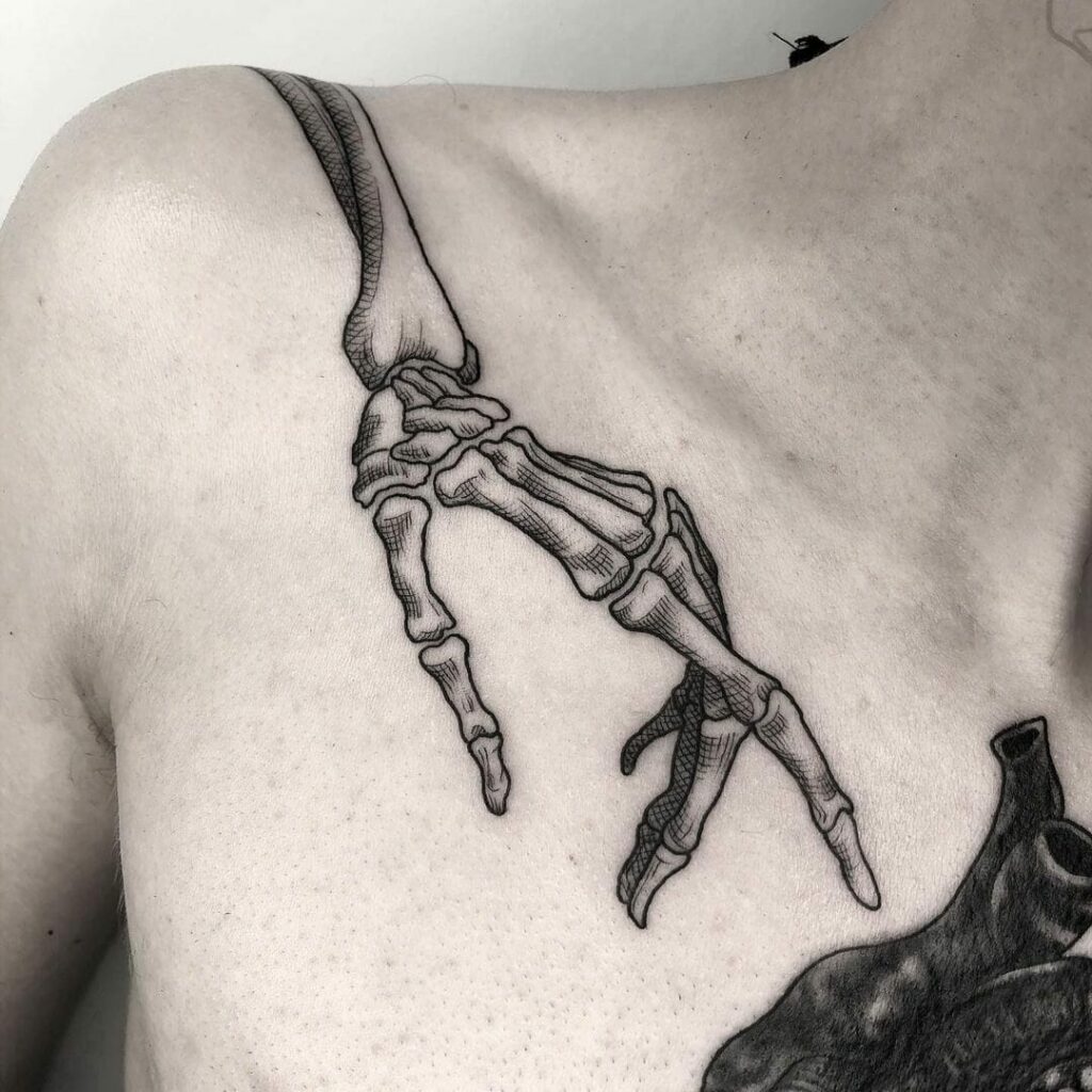 34 Hand Skeleton Tattoo Designs for 2024 14 Skeleton Hand Tattoo With A Snake